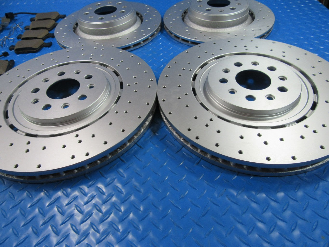 Maserati Levante S front rear brake pads and rotors drilled TopEuro #7355 Wholesale
