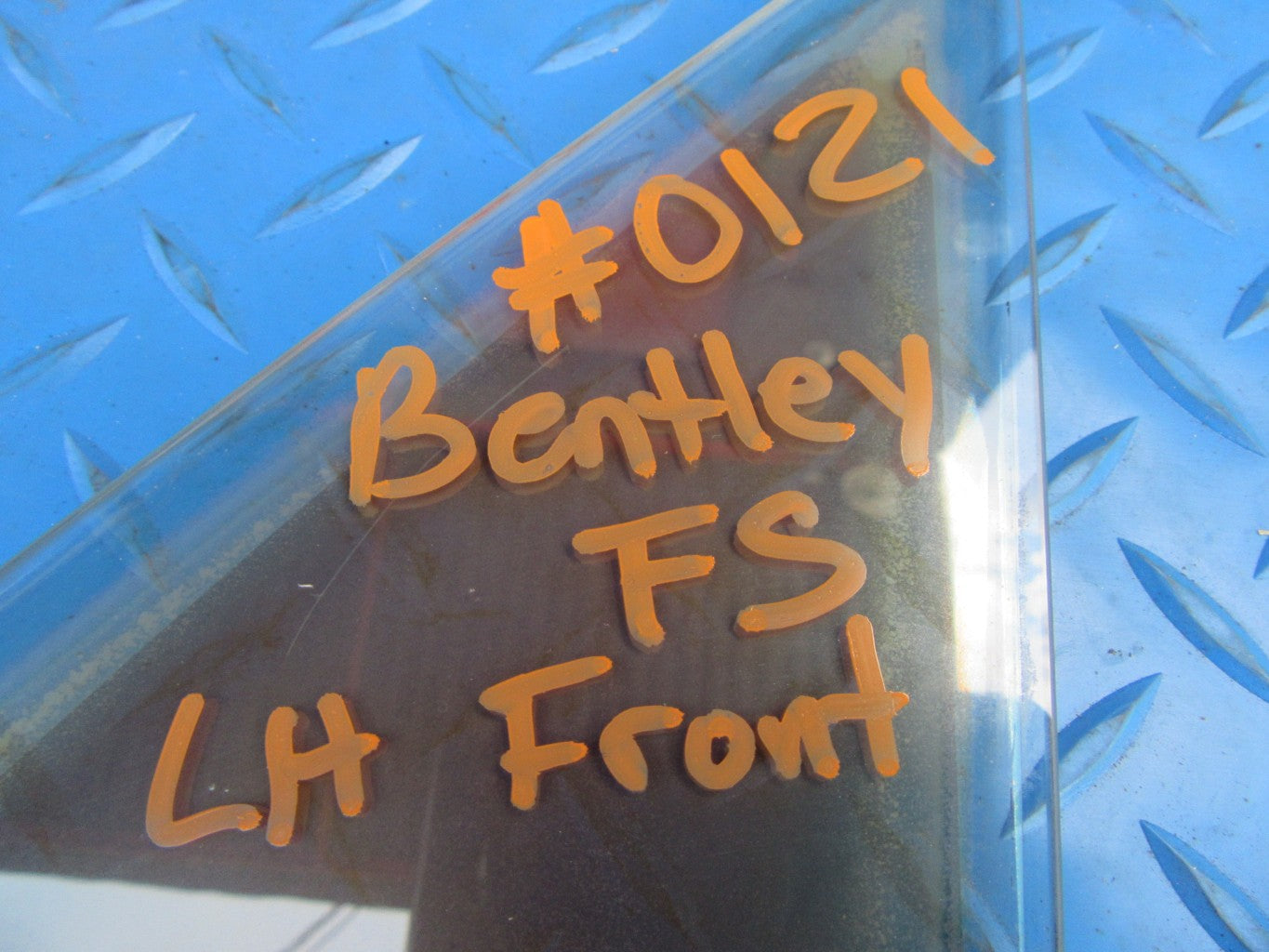 Bentley Continental Flying Spur left front door vent glass #0121