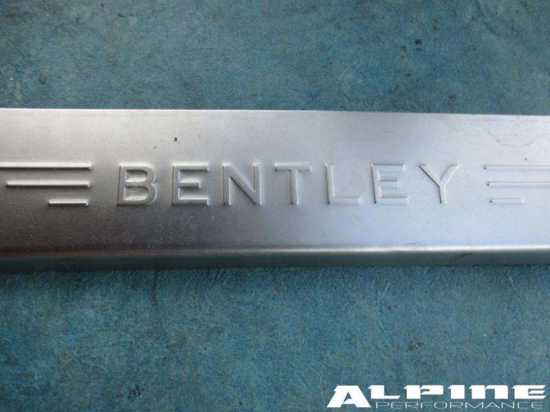 Bentley Continental Flying Spur right rear door sill trim emblem plate
