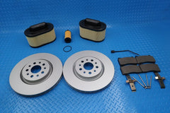 Maserati Ghibli front brake pads rotors filter service kit TopEuro #9307