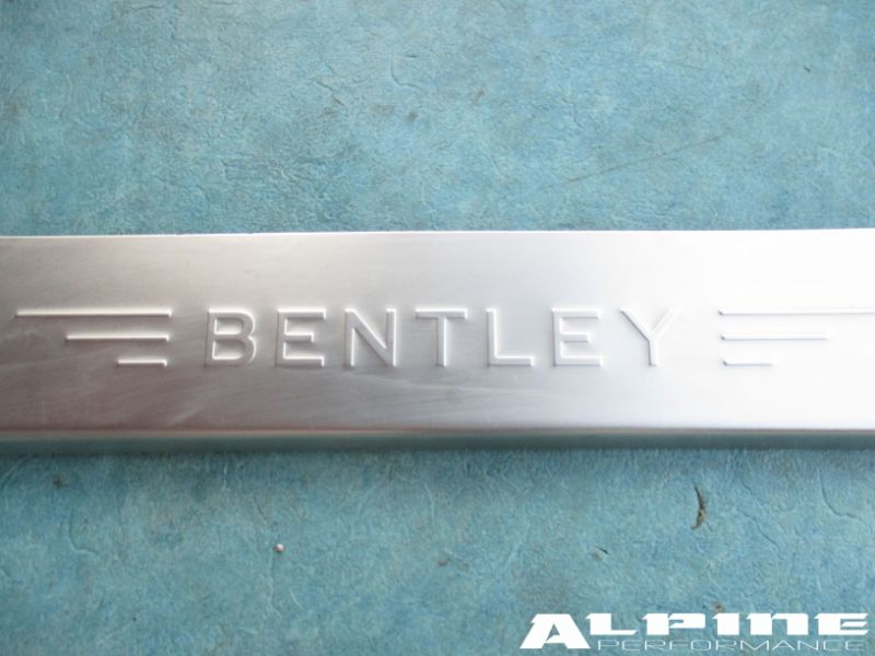 Bentley Continental Flying Spur left rear door sill trim emblem plate